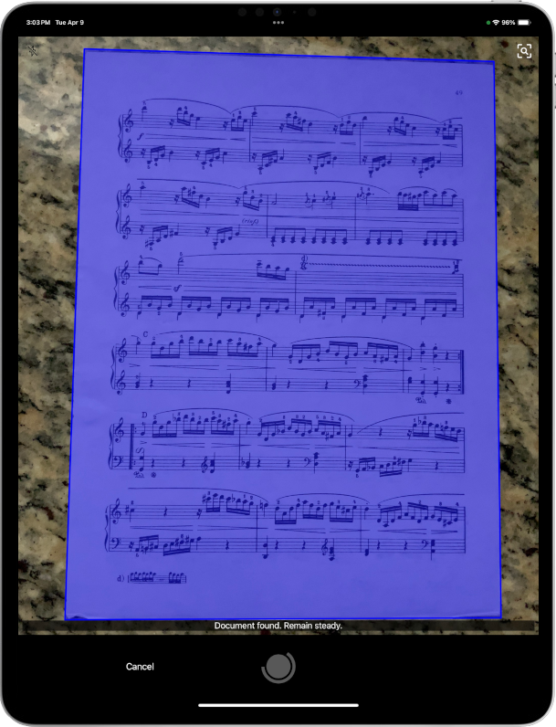 Image of a music score being scanned on an iPad